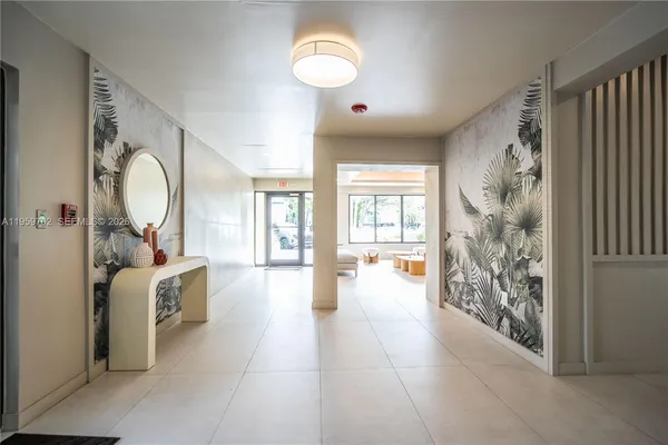 a large living room with a large window