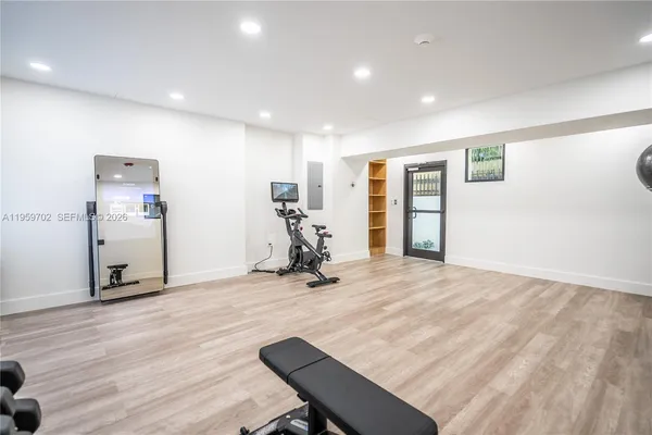 a view of a room with gym equipment