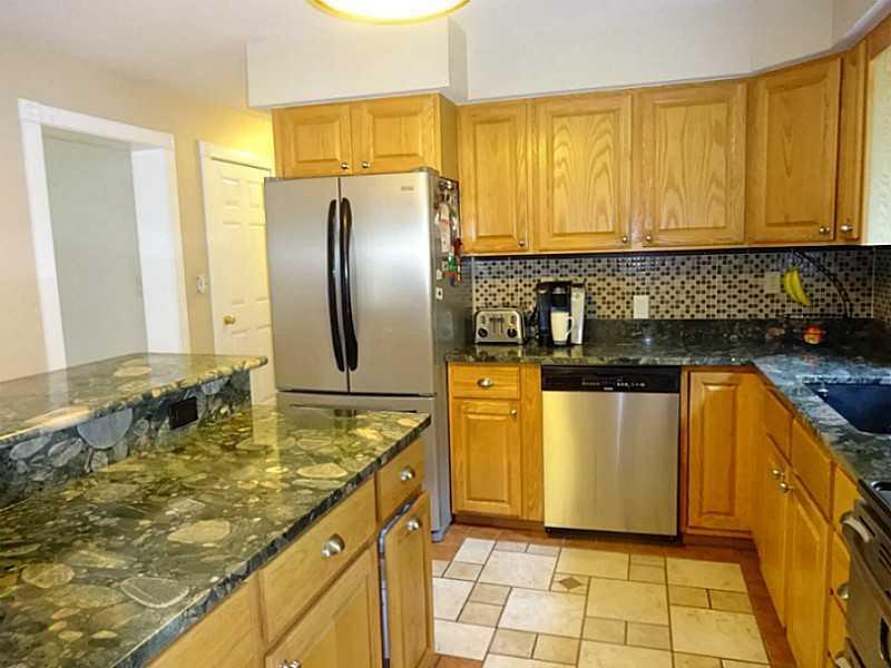 93 Murray Road Dedham, ME 04429 - Photo 14 of 35 Modern stainless steel appliances.