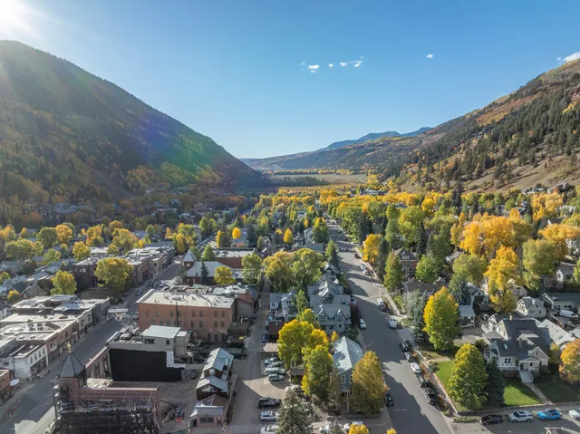 a view of a house with a mountain
