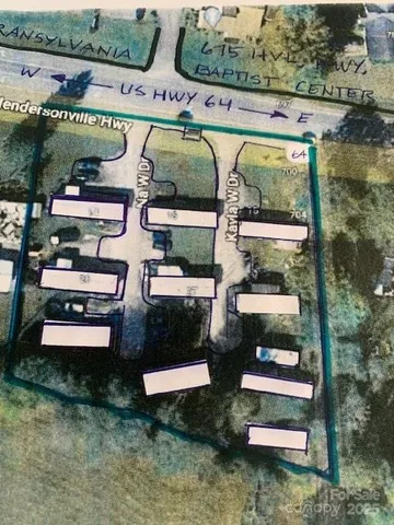 an aerial view of a houses with outdoor space