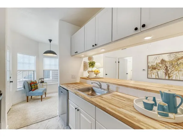 $305,000 | 4760 South Wadsworth Boulevard, Unit 107, Littleton, CO 80123