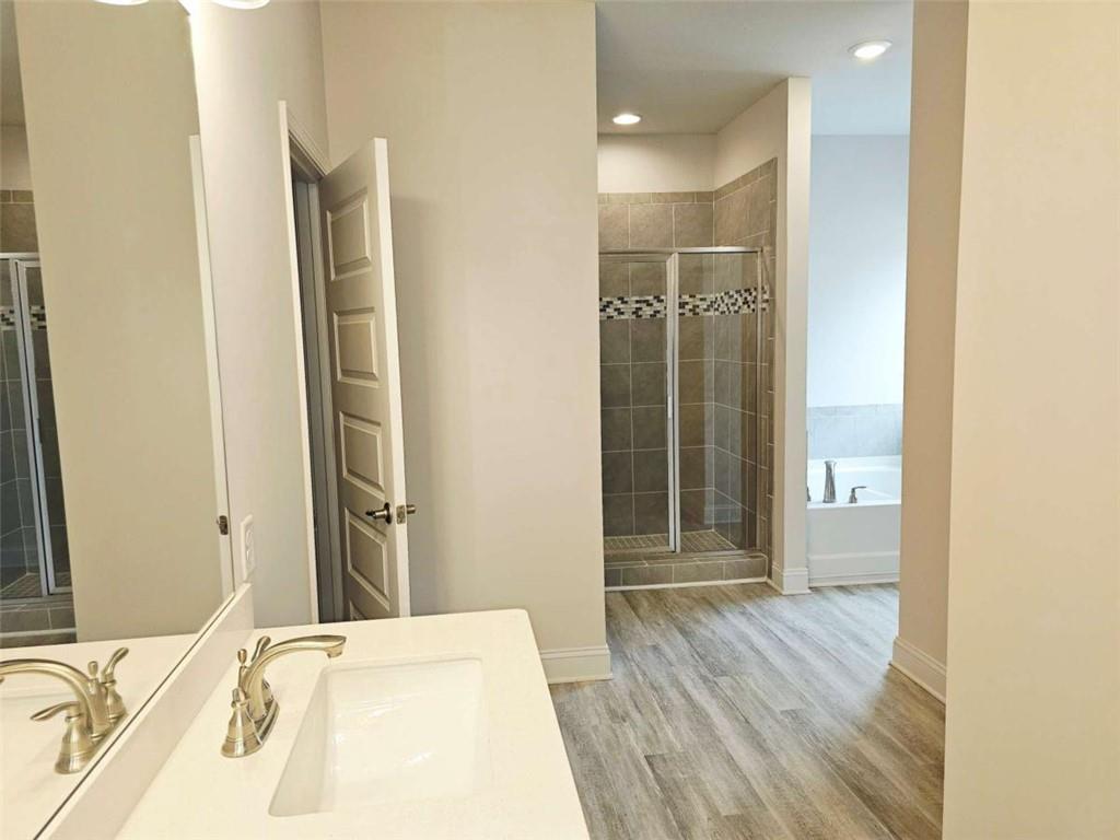 267 Eason Street Bowdon, GA 30108 - Photo 6 of 6 a bathroom with a sink and a shower