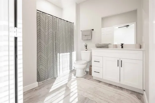 a view of a city with ocean view