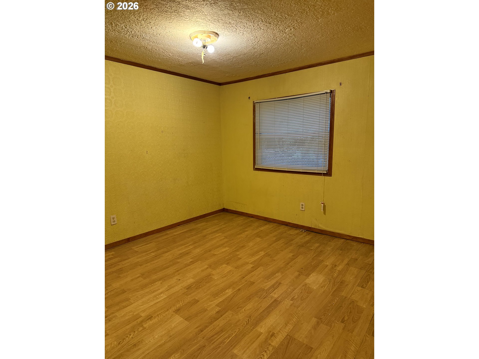 157 Rodgers Road Silverlake, WA 98645 - Photo 19 of 27 a view of a room with a wooden wall