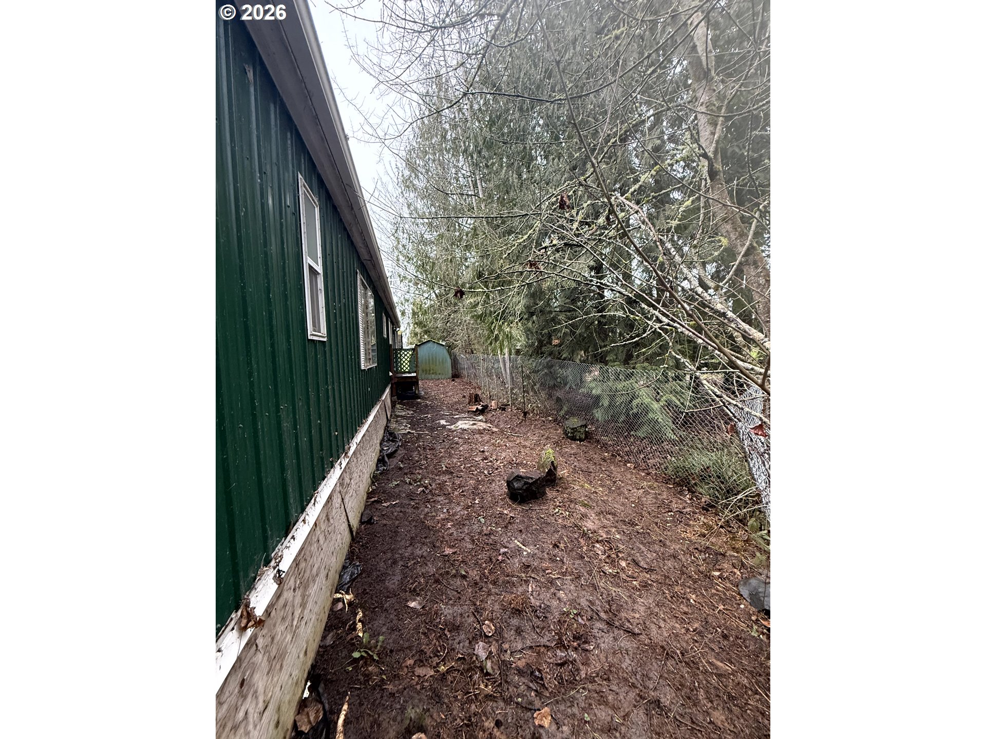 157 Rodgers Road Silverlake, WA 98645 - Photo 2 of 27 a view of a pathway of a house with backyard