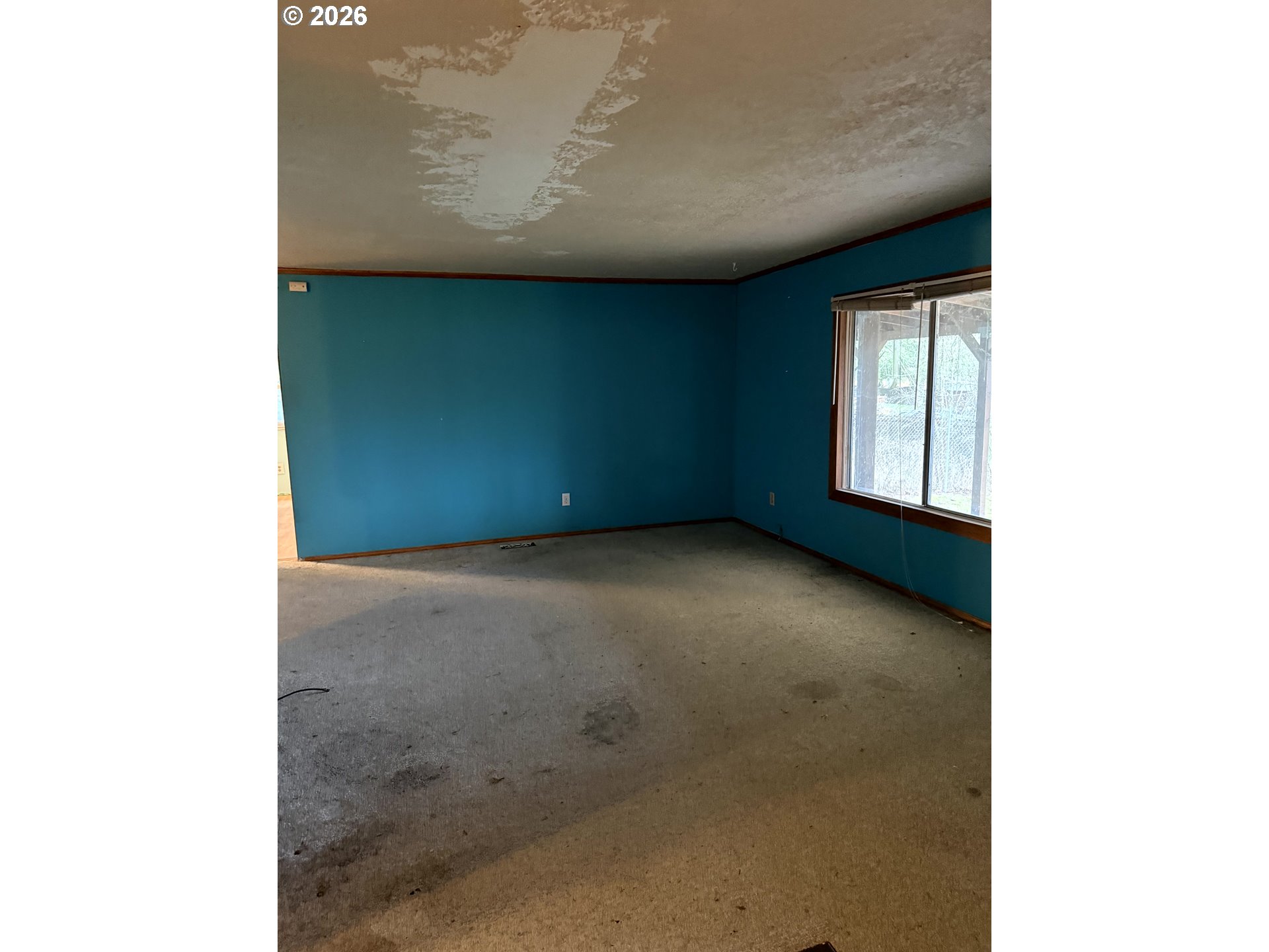157 Rodgers Road Silverlake, WA 98645 - Photo 27 of 27 a view of an empty room with a window