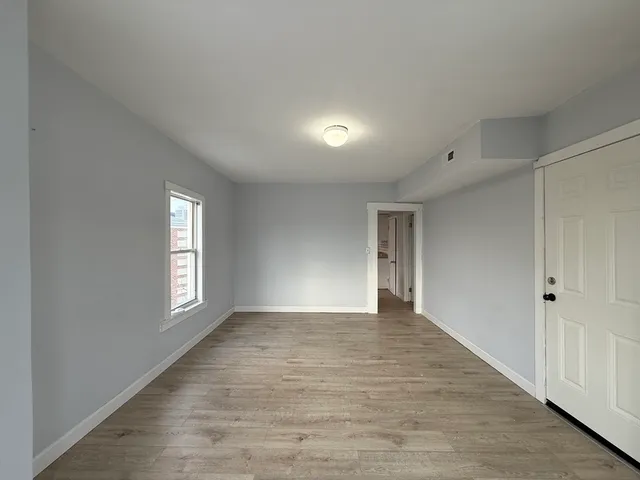 a view of an empty room and window