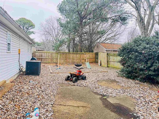 a garden view with a seating space