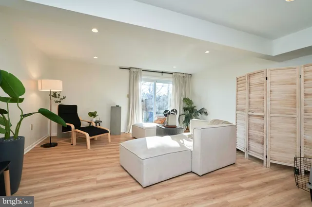 a picture of a bench in a white building