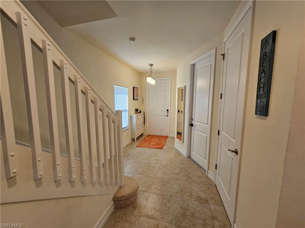 7914 Bristol Circle Naples, FL 34120 - Photo 20 of 22 a view of a bathroom with a tub and shower