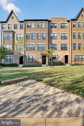 a view of a building with a yard