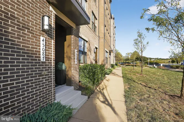 a view of a pathway with a building in the background