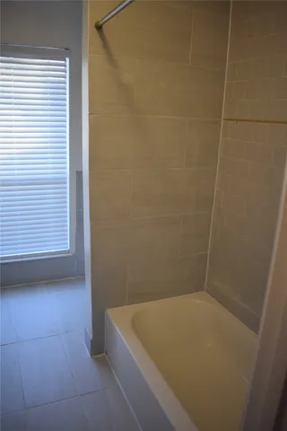 a view of a porch with a wooden floor