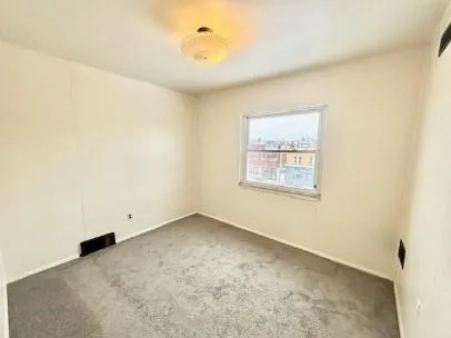 a view of a room with an empty space