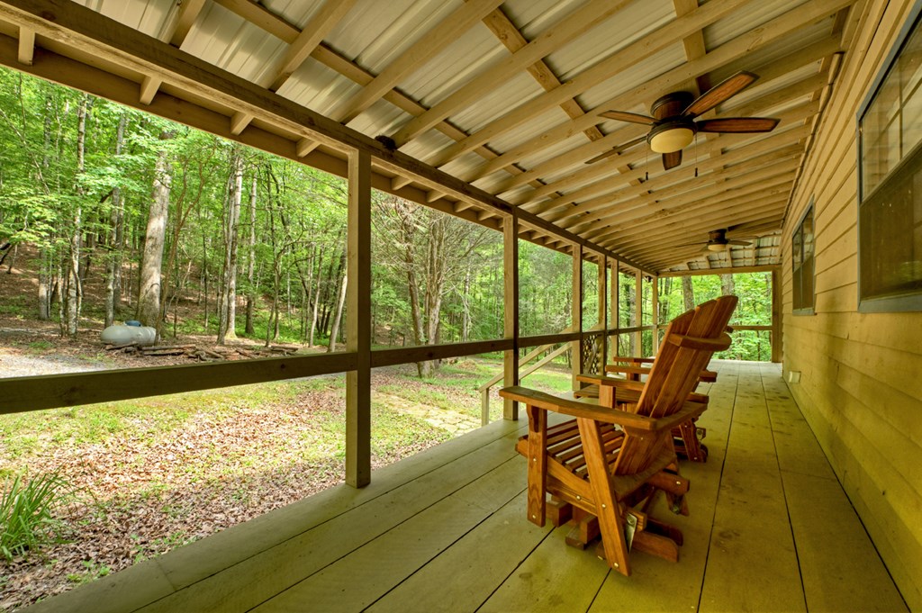 1431 Cashes Valley Lane Cherry Log, GA 30522 - Photo 14 of 57 a view of a swimming pool with outdoor seating