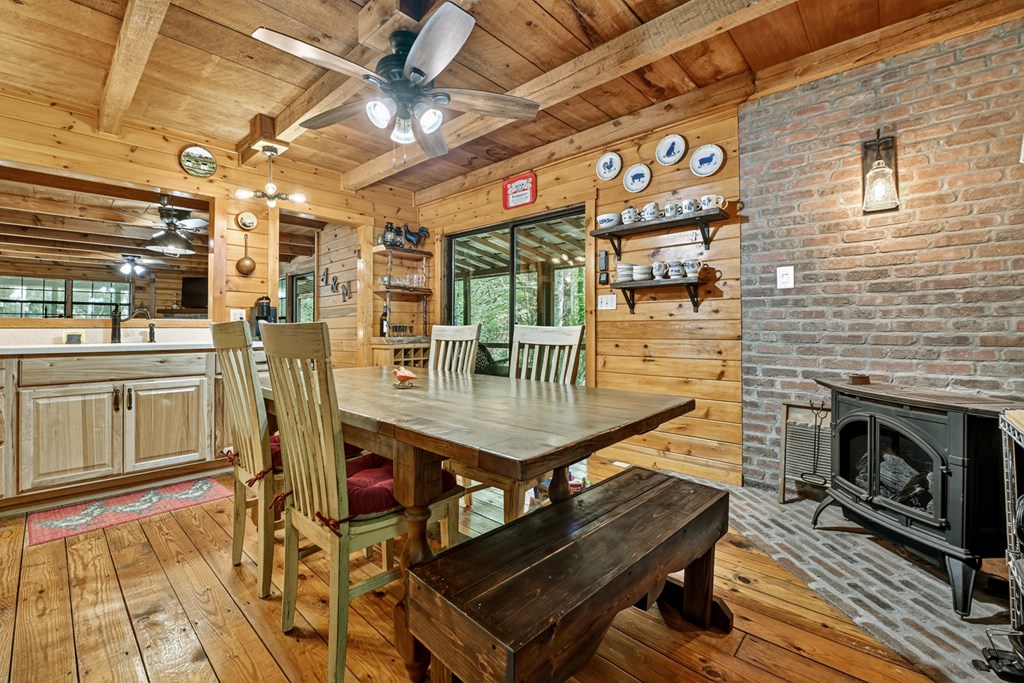 1431 Cashes Valley Lane Cherry Log, GA 30522 - Photo 17 of 57 a dining room with a table and chairs