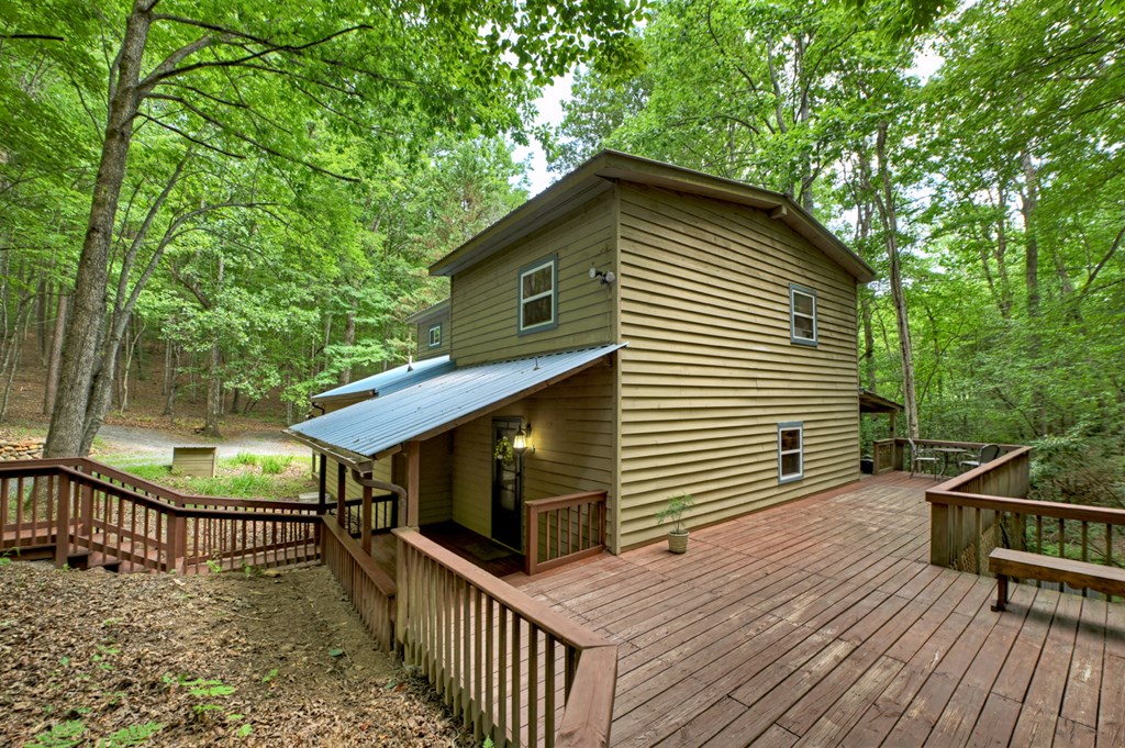 1431 Cashes Valley Lane Cherry Log, GA 30522 - Photo 18 of 57 a porch with seating space