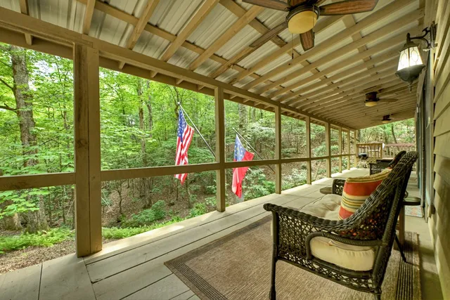 a backyard of a house with lots of trees