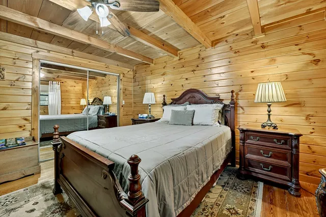 a backyard of a house with lots of green space and garden