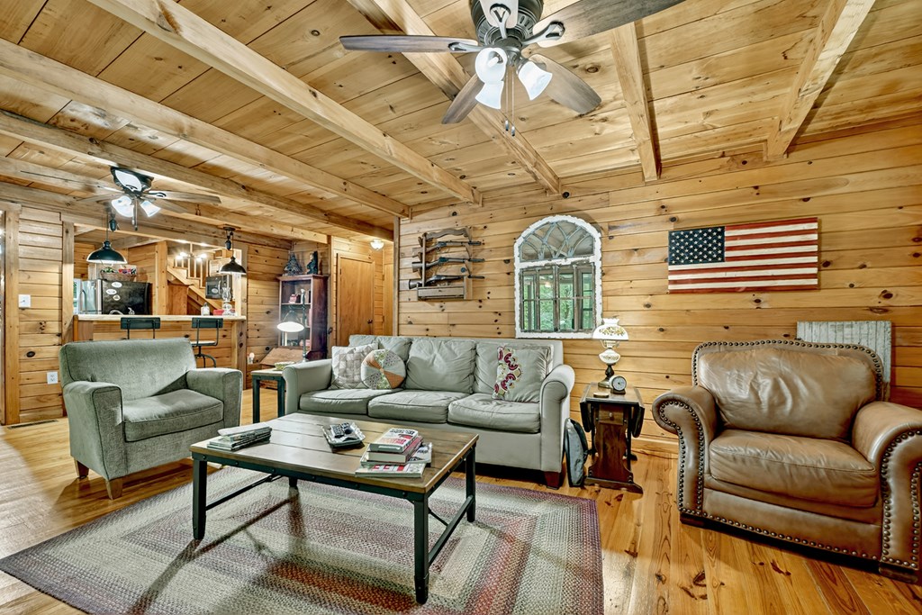 1431 Cashes Valley Lane Cherry Log, GA 30522 - Photo 33 of 57 a living room with furniture and a large window