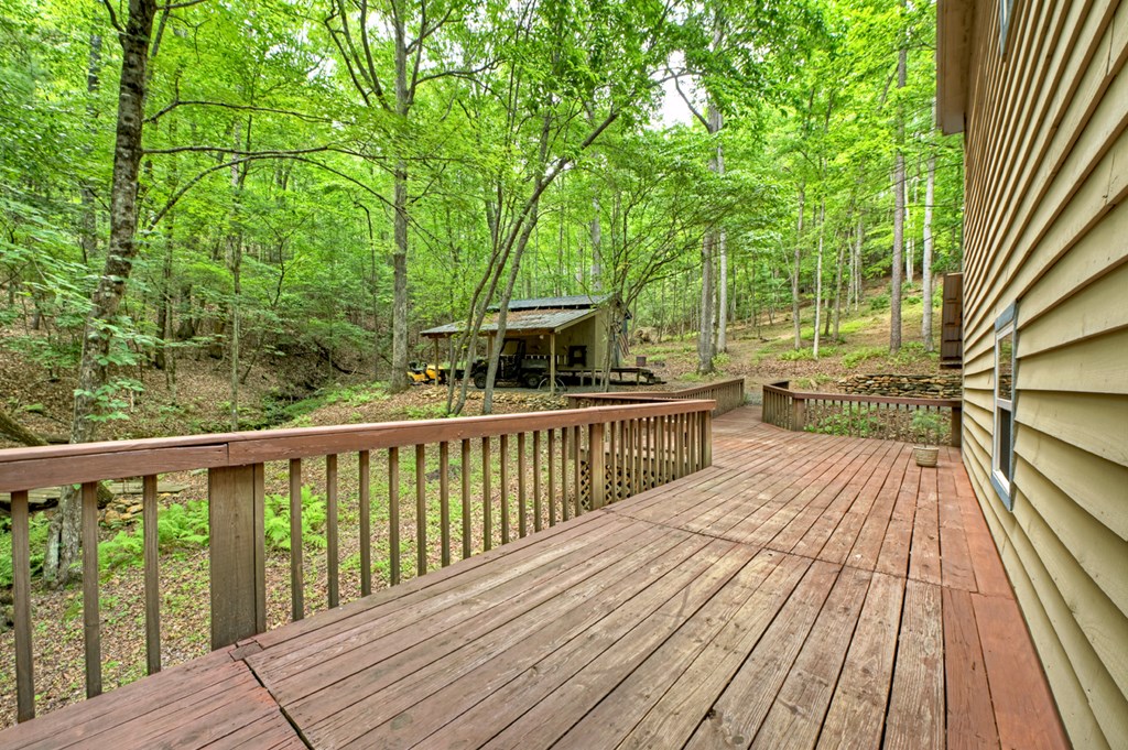 1431 Cashes Valley Lane Cherry Log, GA 30522 - Photo 41 of 57 a view of balcony with wooden floor and fence