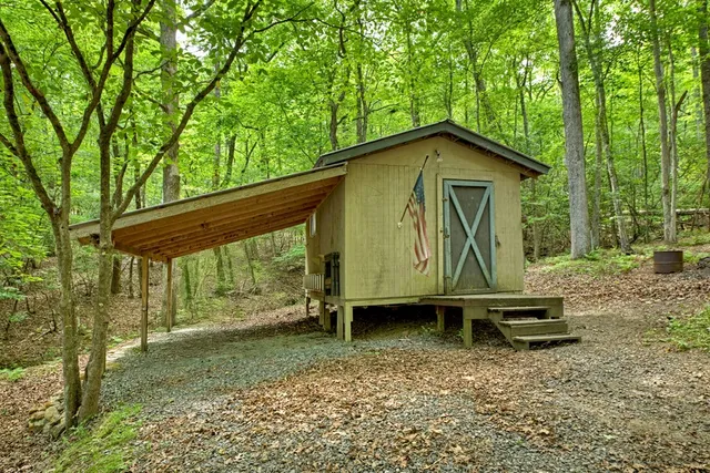 a white toilet sitting next to a bathroom sink
