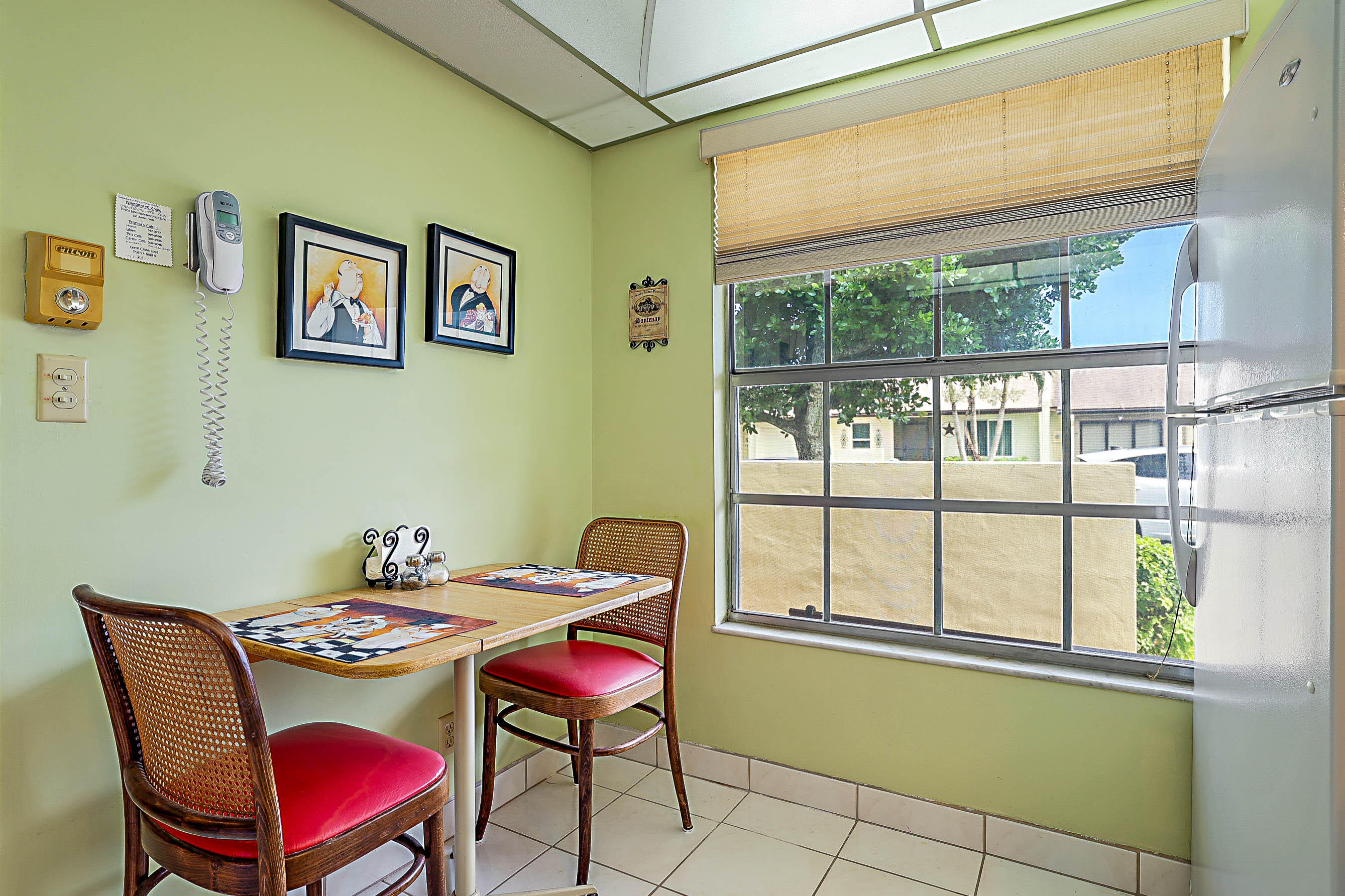 5231 Copperleaf Circle Delray Beach, FL 33484 - Photo 15 of 31 a room with furniture and a window