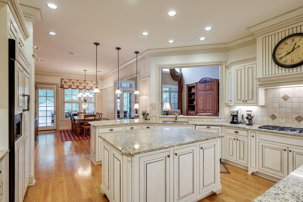 1201 Talon Way Franklin, TN 37069 - Photo 11 of 30 a kitchen with a sink stove and cabinets