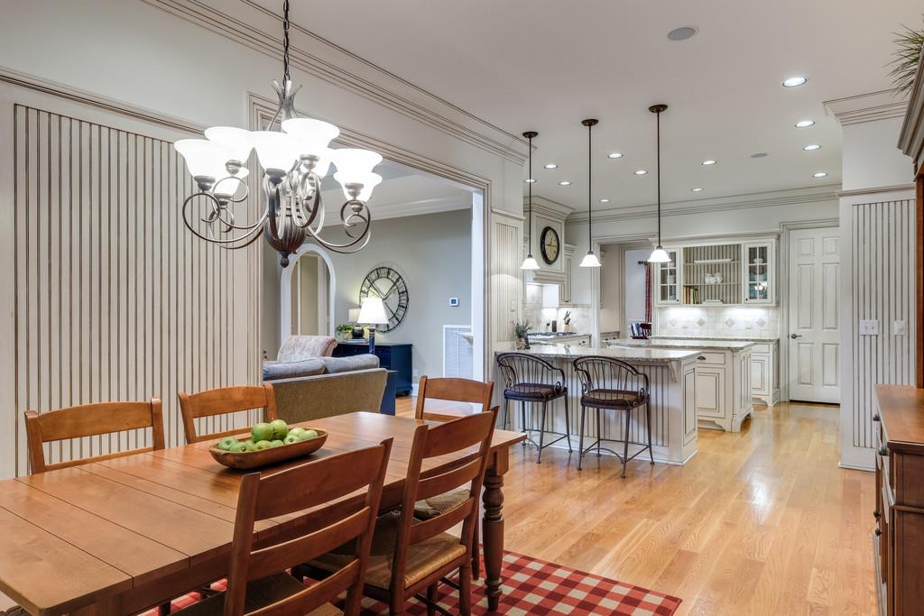 1201 Talon Way Franklin, TN 37069 - Photo 12 of 30 a dining room filled chandelier and kitchen view