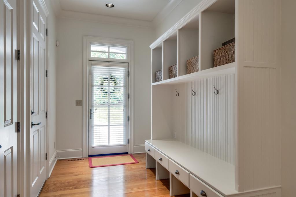 1201 Talon Way Franklin, TN 37069 - Photo 13 of 30 a view of an empty room with wooden floor and a window