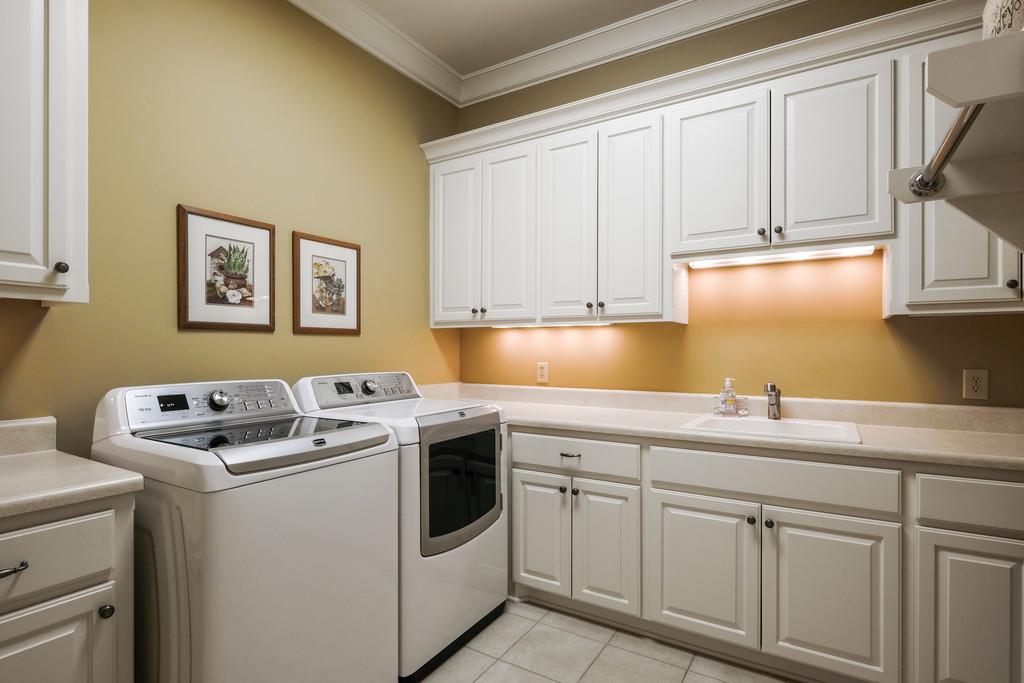 1201 Talon Way Franklin, TN 37069 - Photo 14 of 30 a utility room with sink dryer and washer