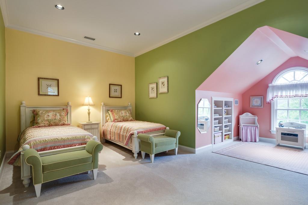 1201 Talon Way Franklin, TN 37069 - Photo 21 of 30 a bedroom with a bed and a chair