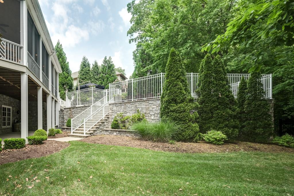 1201 Talon Way Franklin, TN 37069 - Photo 29 of 30 a backyard of a house with lots of green space
