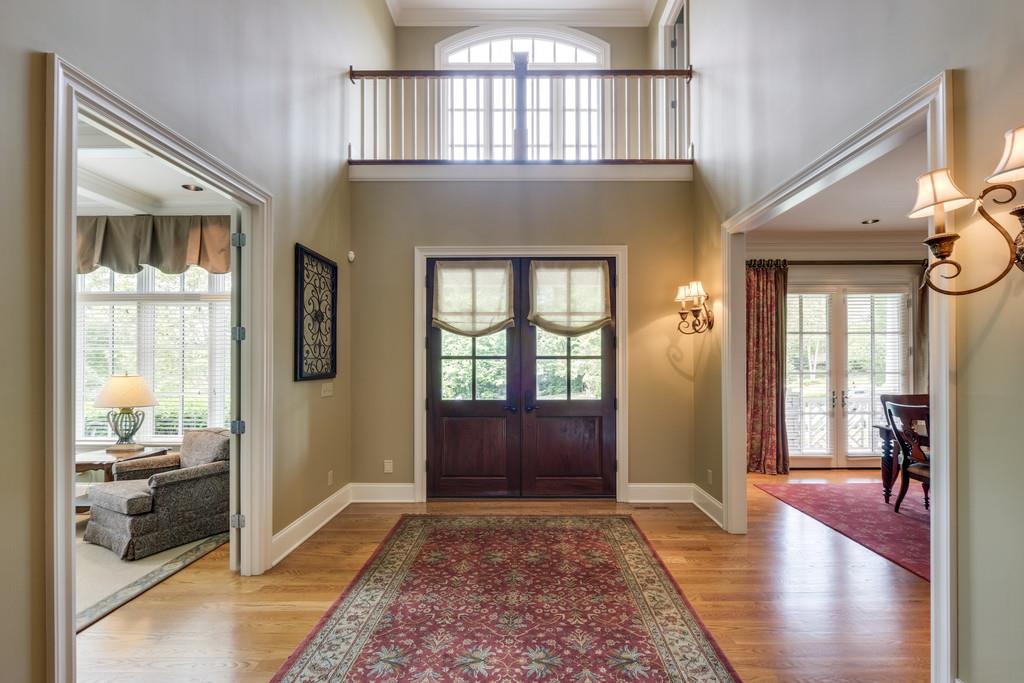 1201 Talon Way Franklin, TN 37069 - Photo 4 of 30 a view of a hallway with wooden floor and windows