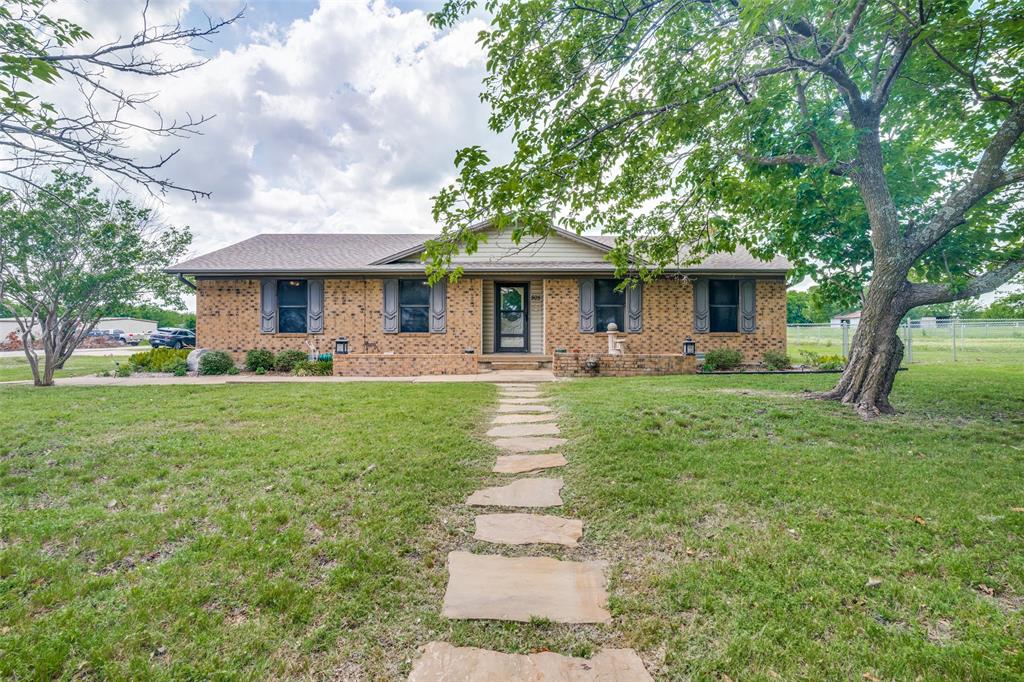 Well Maintained move-in ready home on nearly 2 acres with a barn near Historic Downtown Wylie