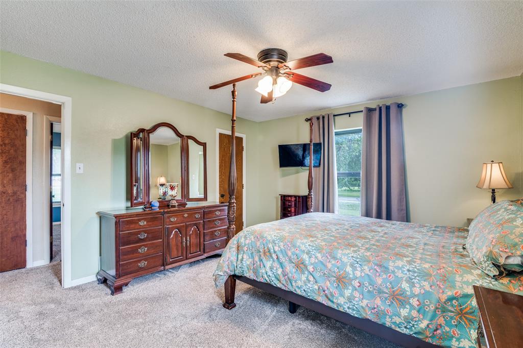 805 Paul Wilson Road Wylie, TX 75098 - Photo 18 of 38 Primary suite has ample closet space and attached bathroom