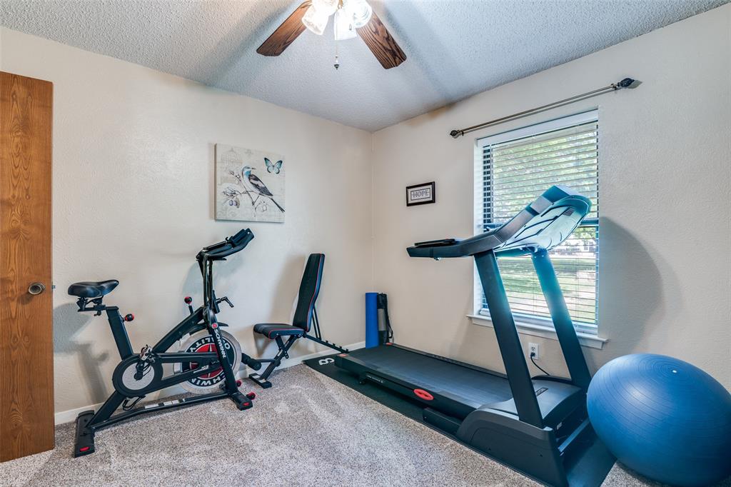 805 Paul Wilson Road Wylie, TX 75098 - Photo 22 of 38 Guest rooms all have ceiling fans, ample closet space, and recent carpet.