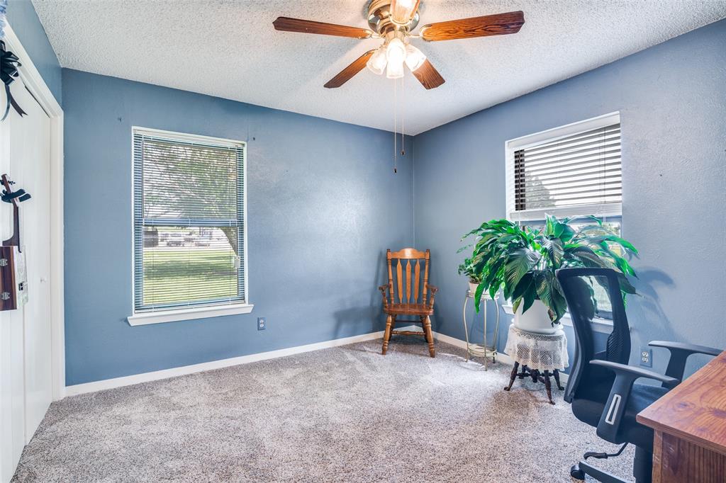 805 Paul Wilson Road Wylie, TX 75098 - Photo 24 of 38 Guest rooms all have ceiling fans, ample closet space, and recent carpet.