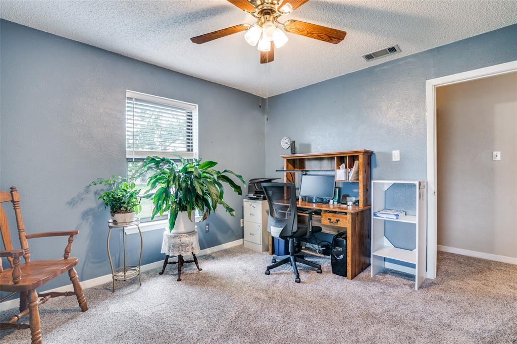 805 Paul Wilson Road Wylie, TX 75098 - Photo 25 of 38 Guest rooms all have ceiling fans, ample closet space, and recent carpet.