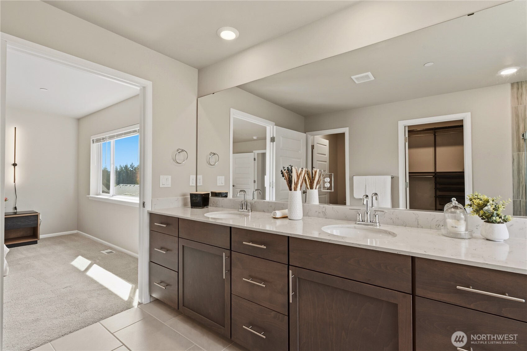 19432 9th Avenue Southeast Bothell, WA 98012 - Photo 19 of 33 a bathroom with a sink double vanity granite and a mirror
