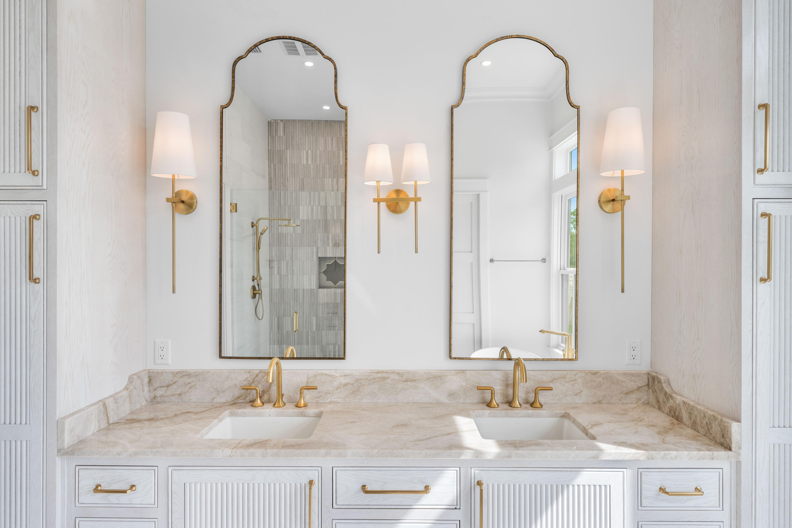 65 Morning Lgt Way Watersound, FL 32461 - Photo 20 of 59 a bathroom with double vanity sinks and a mirror