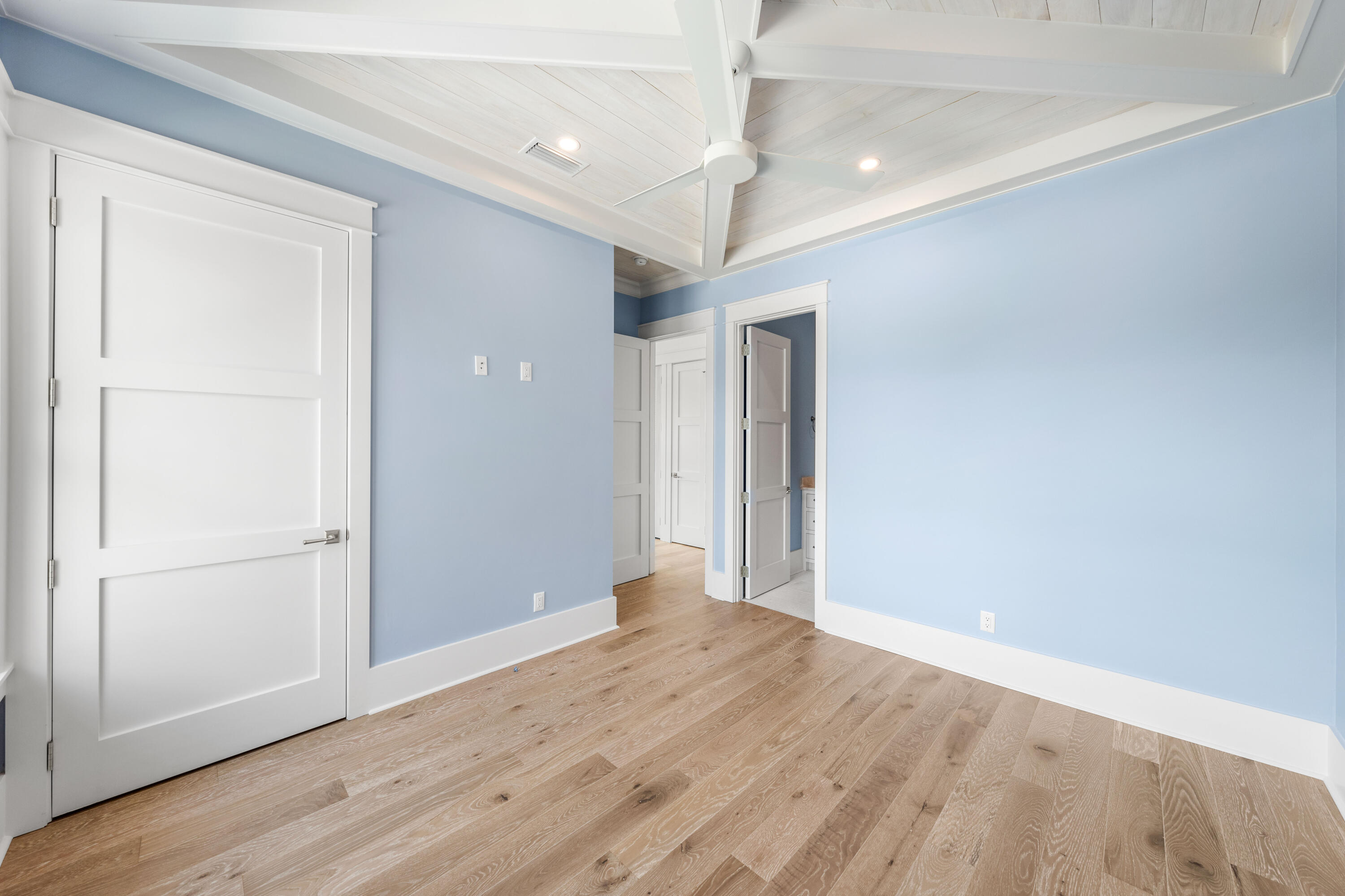 65 Morning Lgt Way Watersound, FL 32461 - Photo 24 of 59 wooden floor in an empty room with a window