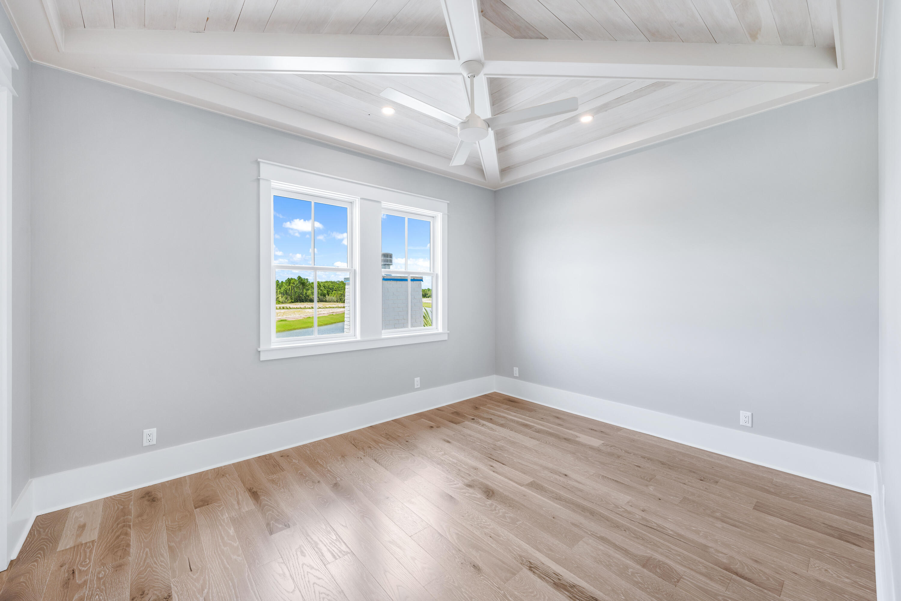 65 Morning Lgt Way Watersound, FL 32461 - Photo 28 of 59 wooden floor in an empty room with a window