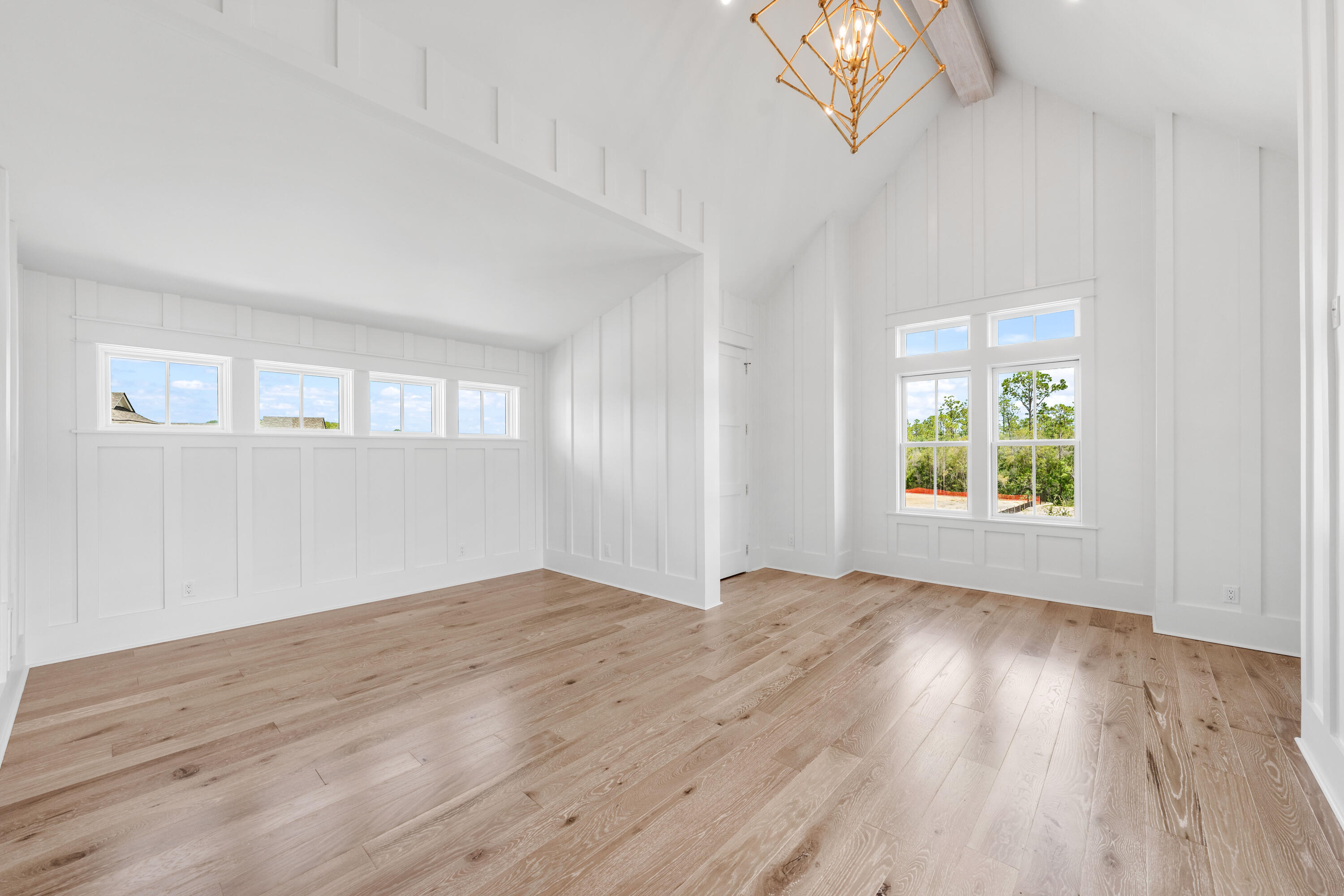 65 Morning Lgt Way Watersound, FL 32461 - Photo 39 of 59 wooden floor in an empty room with a window