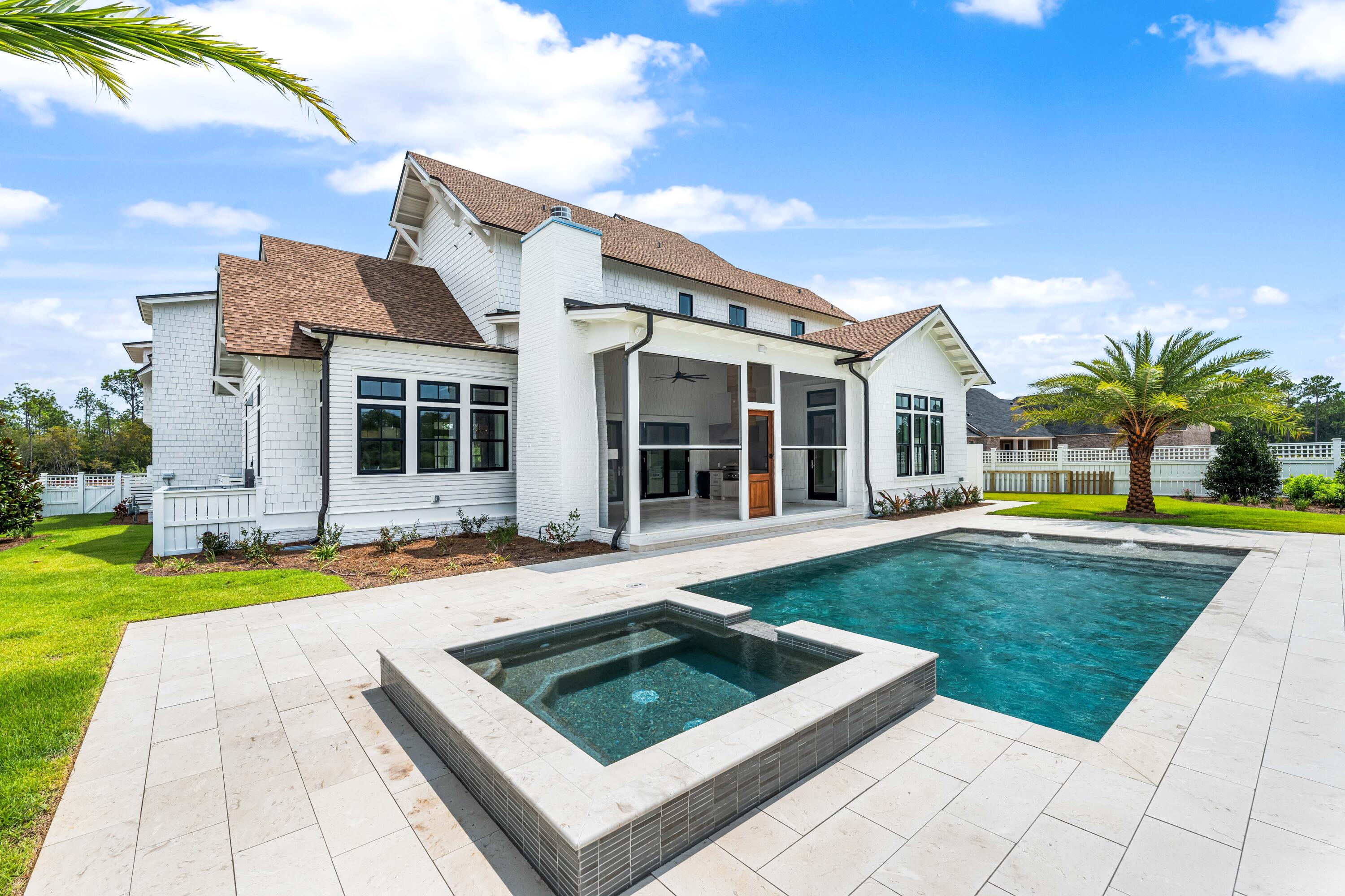 65 Morning Lgt Way Watersound, FL 32461 - Photo 46 of 59 a view of a house with swimming pool and a yard