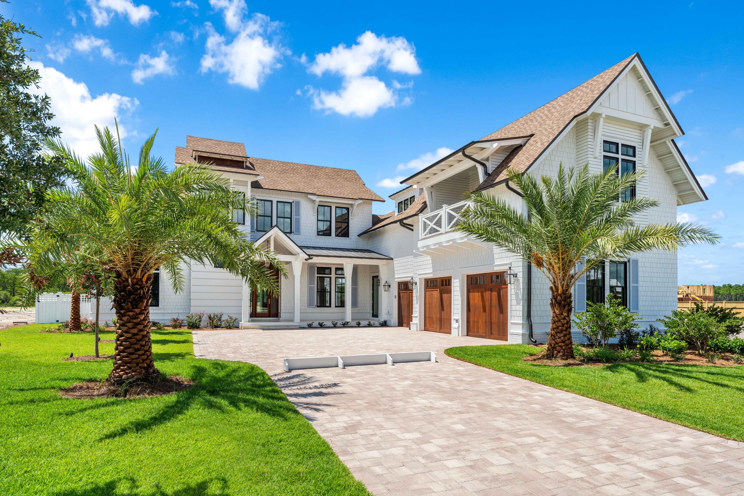 65 Morning Lgt Way Watersound, FL 32461 - Photo 50 of 59 a front view of a house with a yard