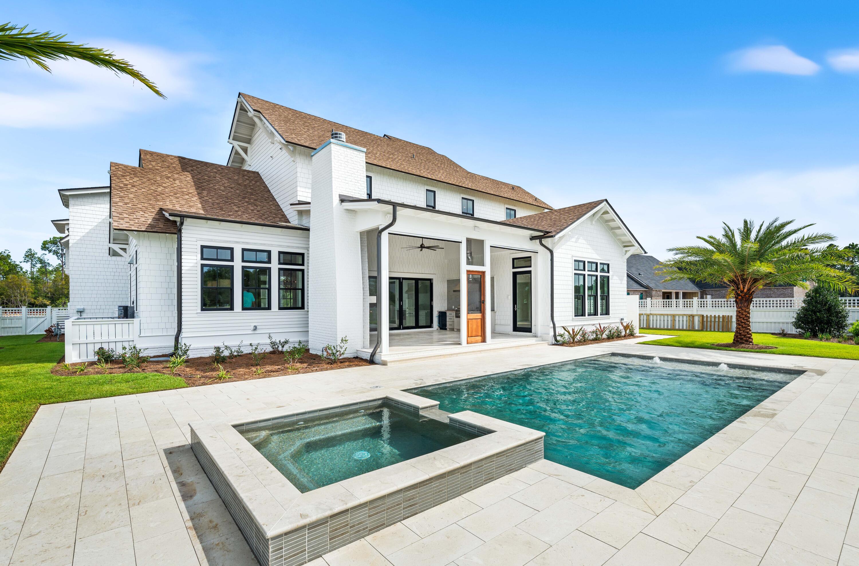 65 Morning Lgt Way Watersound, FL 32461 - Photo 52 of 59 a view of house with swimming pool outdoor seating