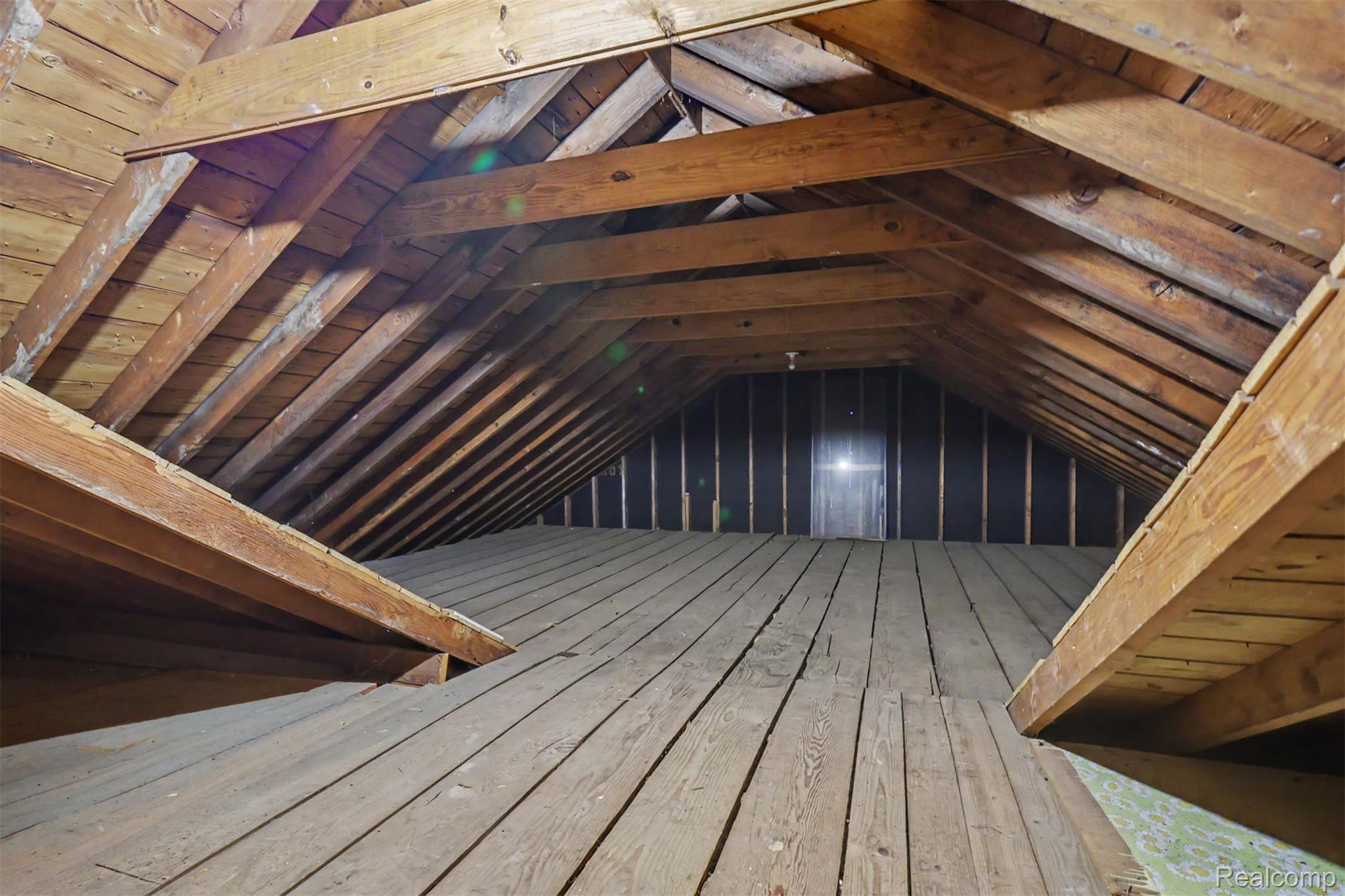 7136 Rosedale Boulevard Allen Park, MI 48101 - Photo 37 of 51 Exposed wooden beams, sloped wood-plank ceilings, and wood-plank flooring