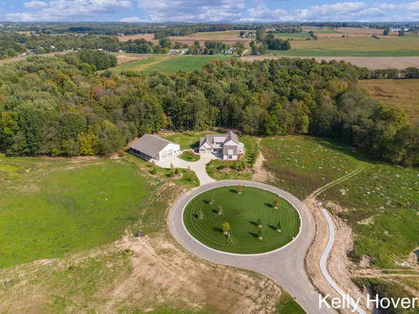 $2,100,000 | 402 Ottogan Hls Court, Byron Center, MI 49315